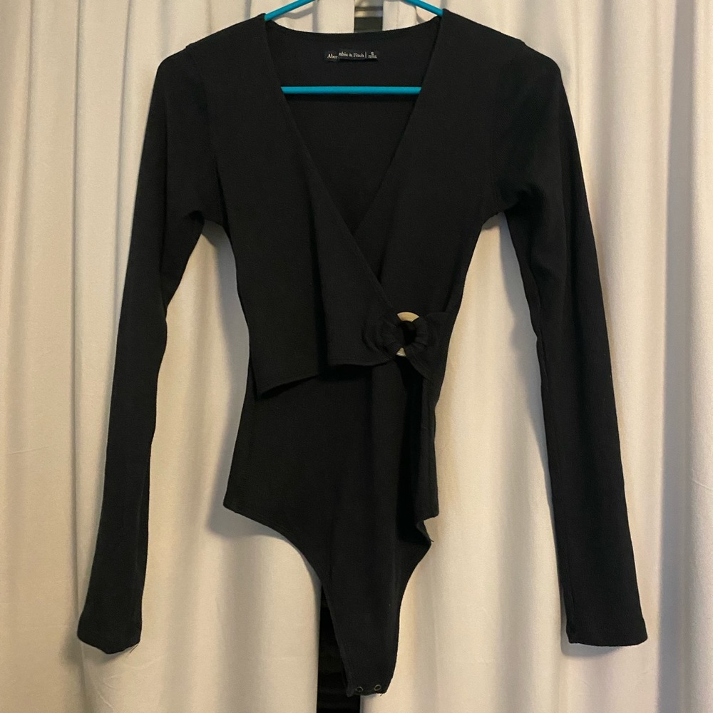 Wrap front ribbed long sleeve body suit